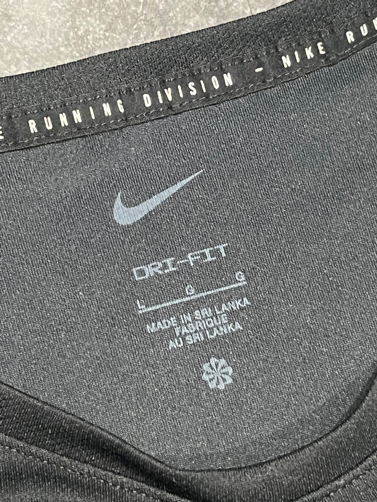 Black & White Nike Men’s Dri Fit Running Division “Bone” T Shirt