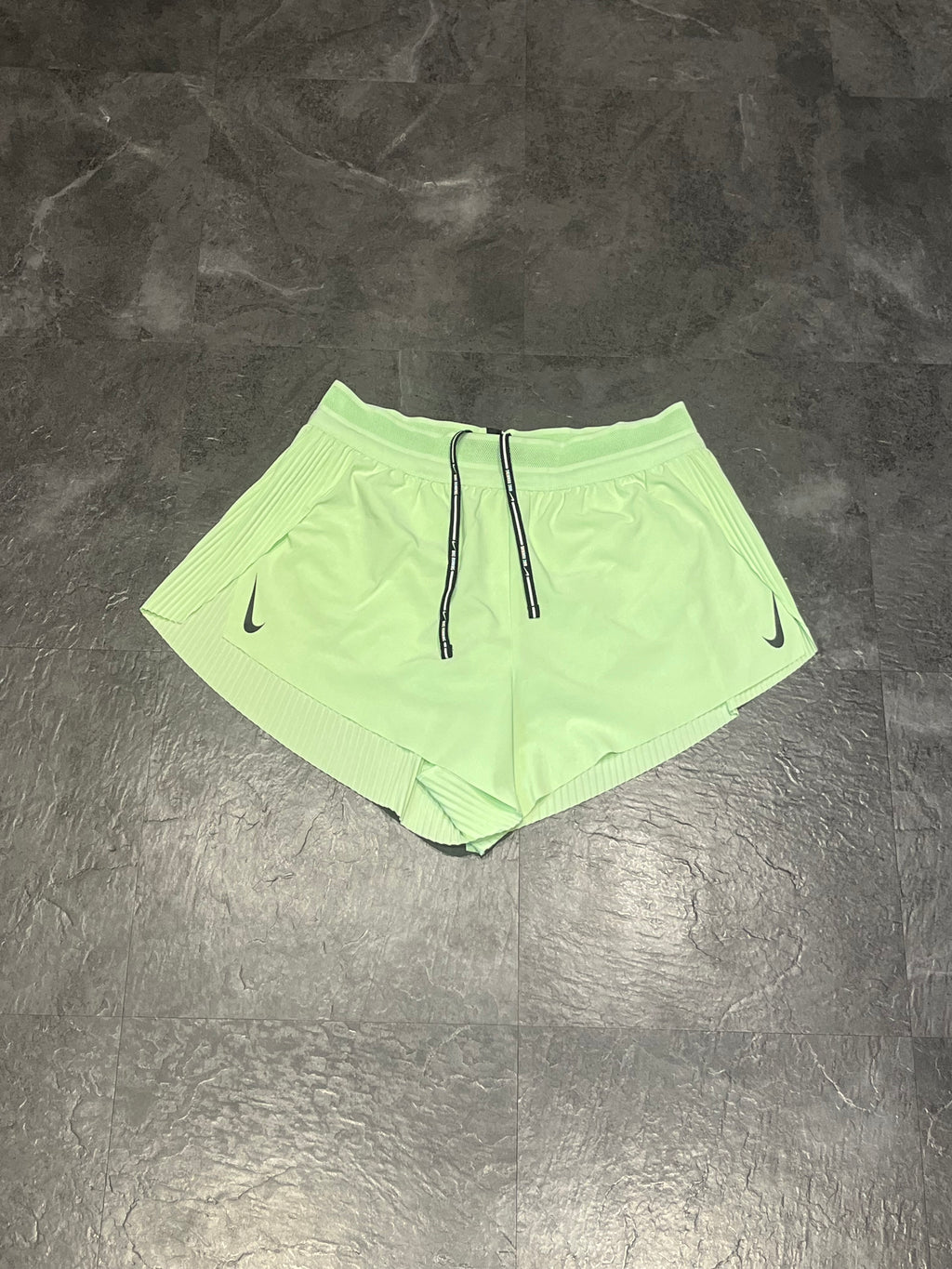 Vapour Green Nike Women’s Dri Fit ADV Aeroswift 3” Racing Split Shorts