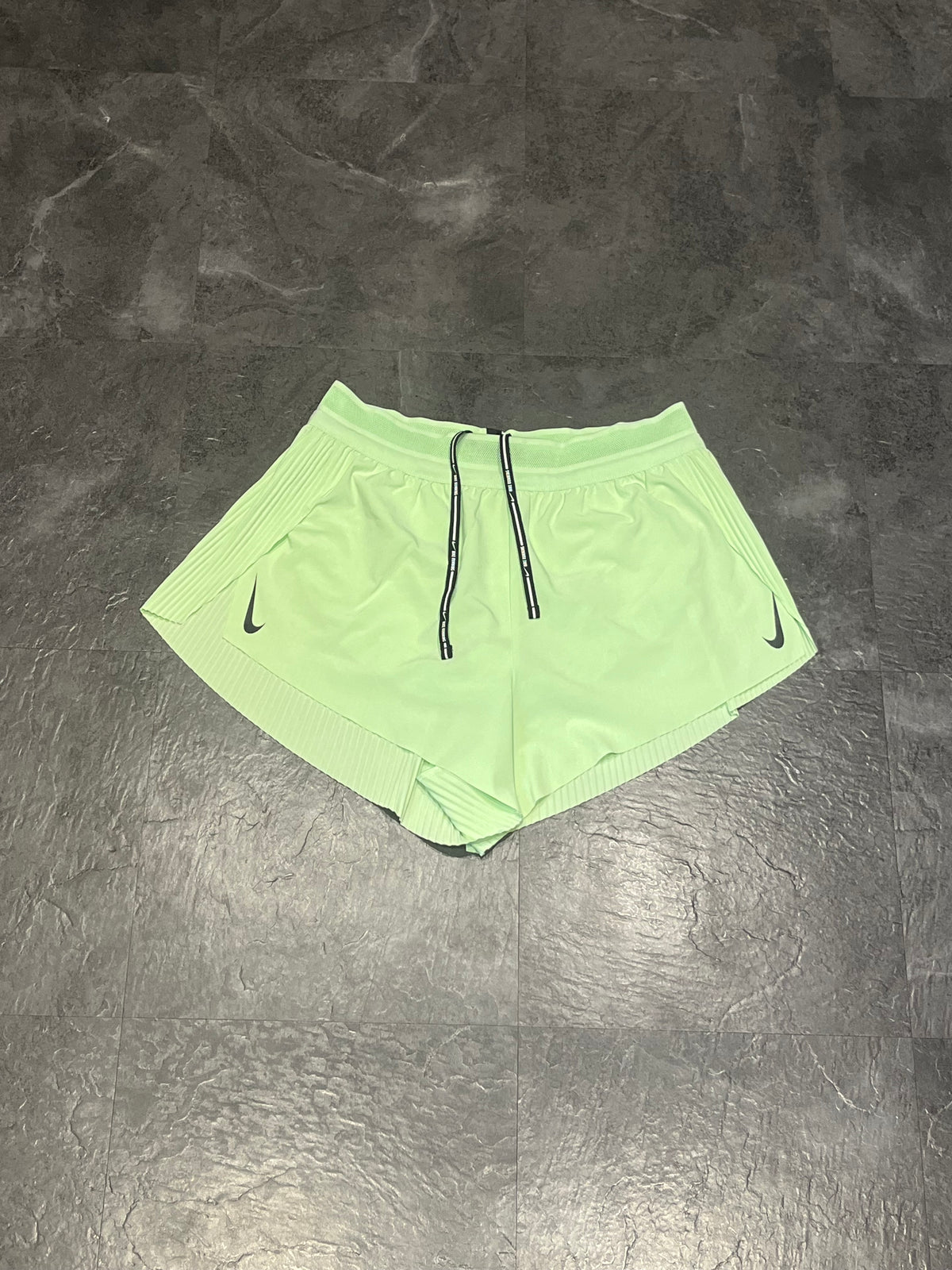 Vapour Green Nike Women’s Dri Fit ADV Aeroswift 3” Racing Split Shorts