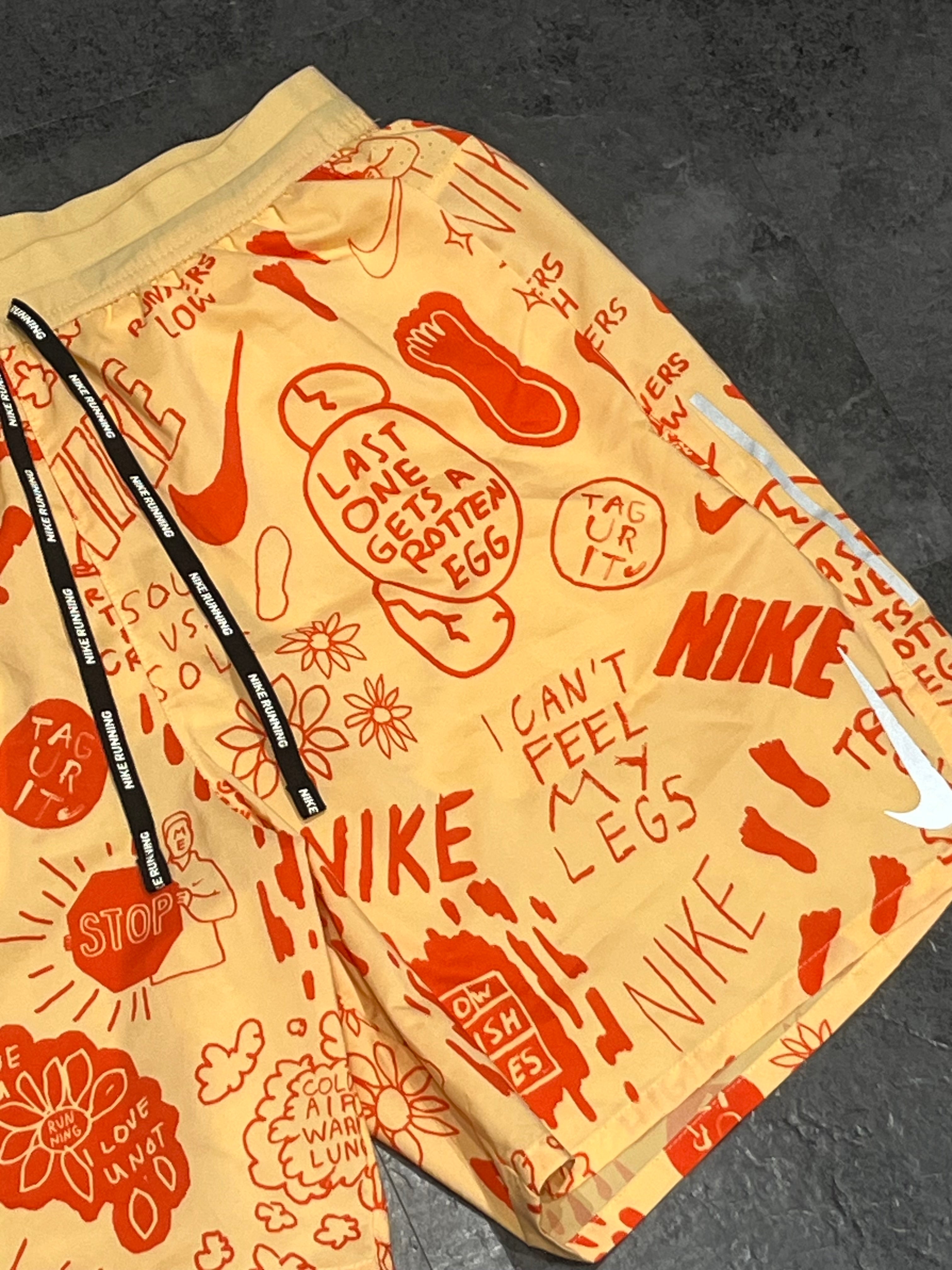 Yellow/Orange Nike A.I.R Nathan Bell Men’s Dri Fit Flex Stride 7” Running Shorts