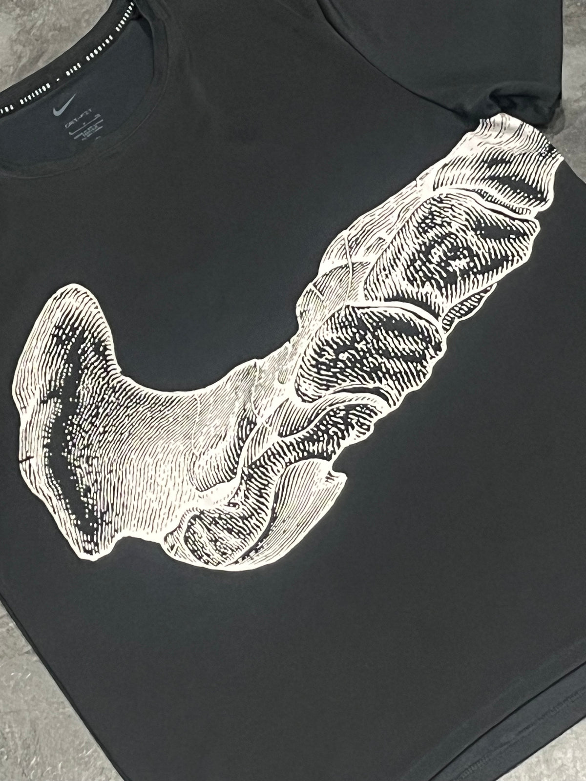 Black & White Nike Men’s Dri Fit Running Division “Bone” T Shirt