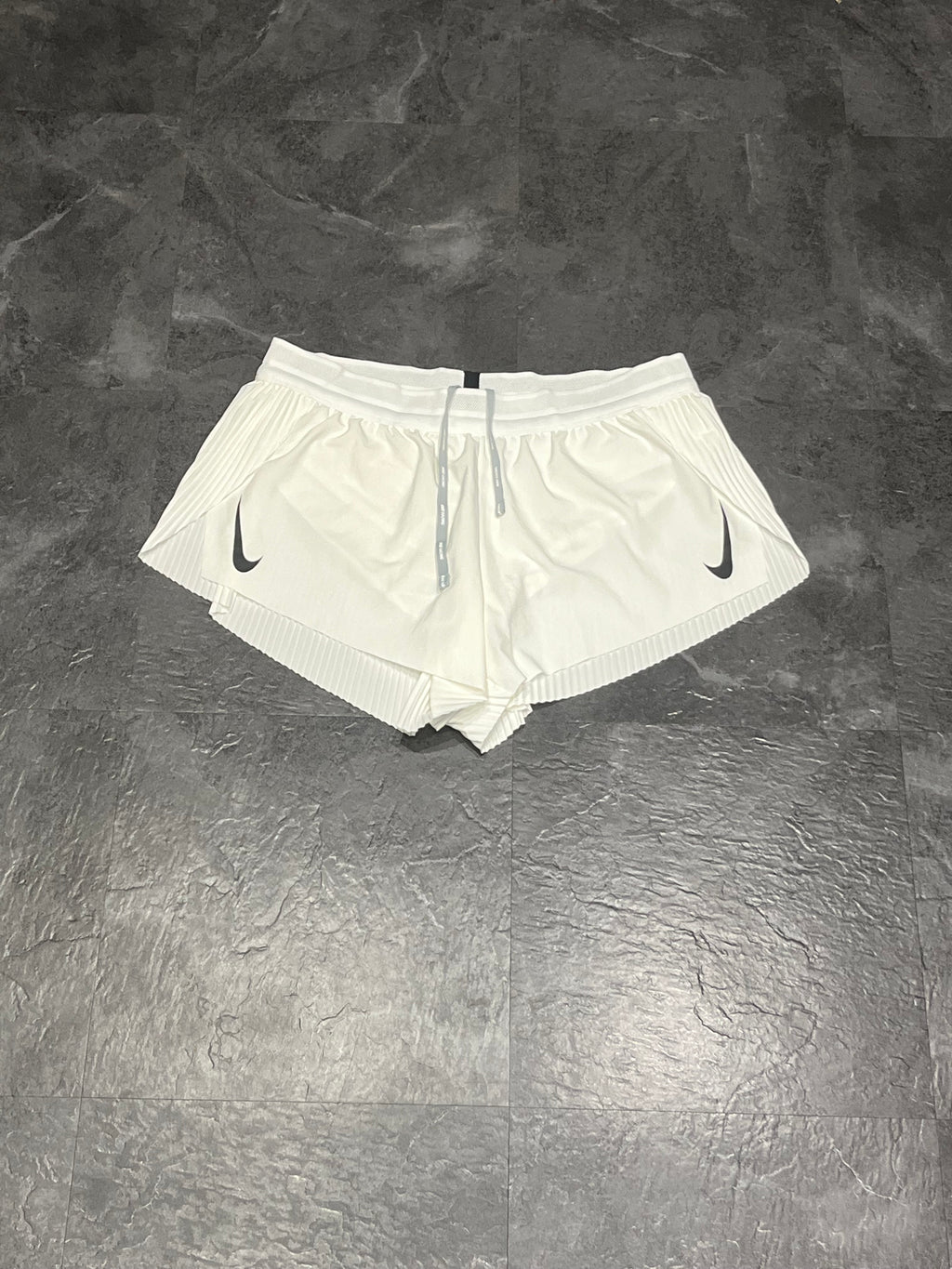 White Nike Women’s Dri Fit ADV AeroSwift Racing Split Shorts