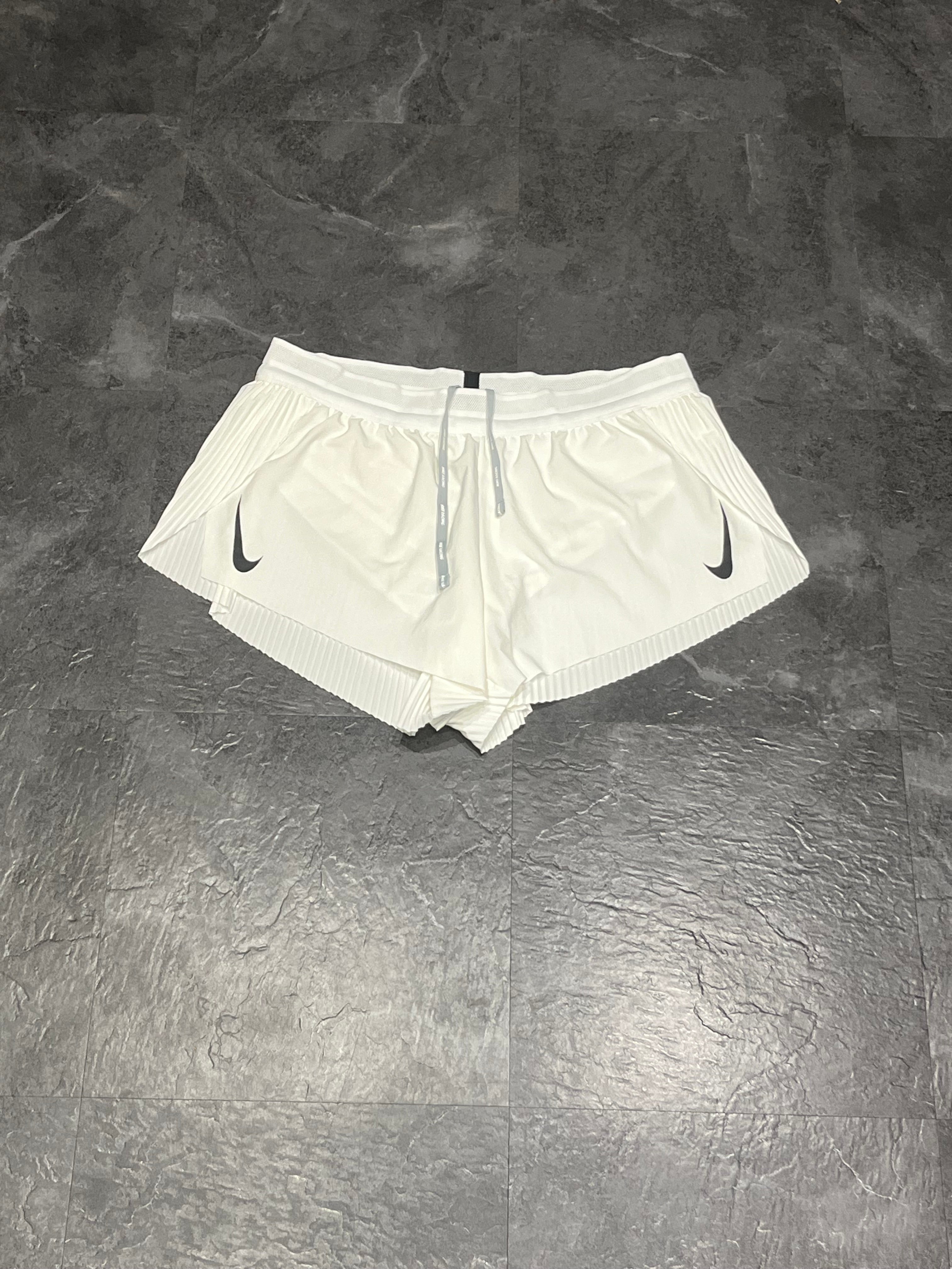 White Nike Women’s Dri Fit ADV AeroSwift Racing Split Shorts