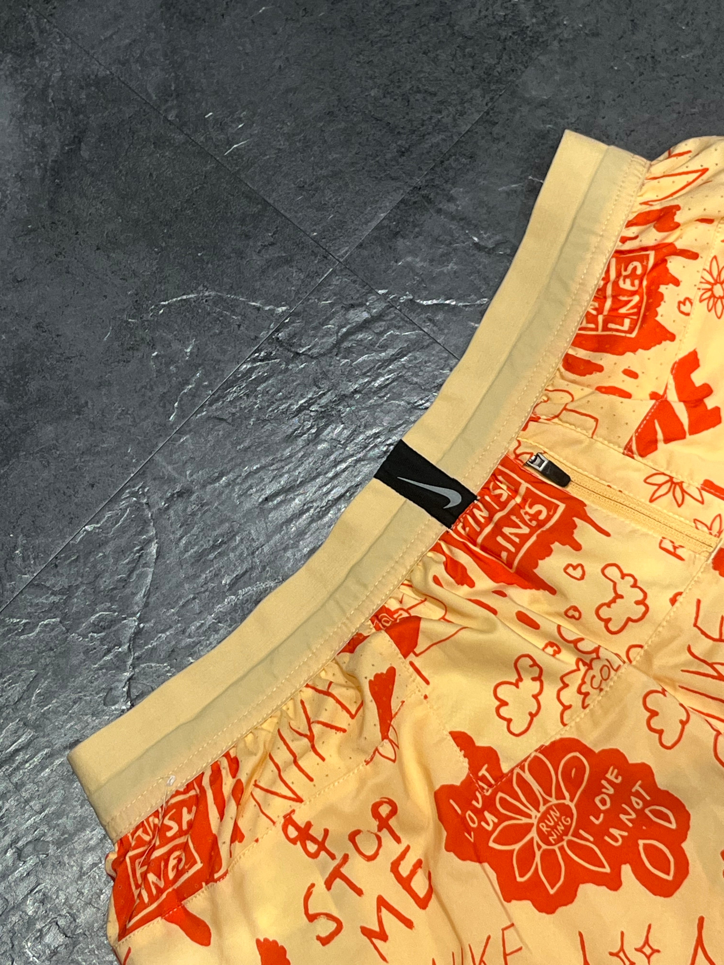Yellow/Orange Nike A.I.R Nathan Bell Men’s Dri Fit Flex Stride 7” Running Shorts