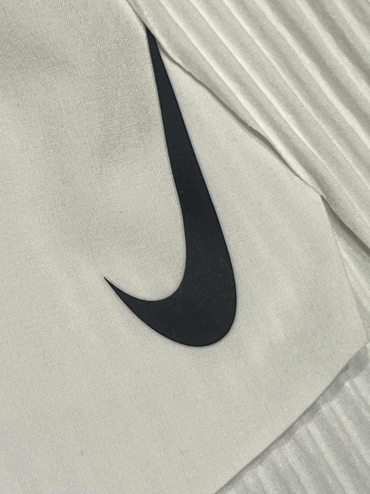 White Nike Women’s Dri Fit ADV Aeroswift 3” Racing Split Shorts