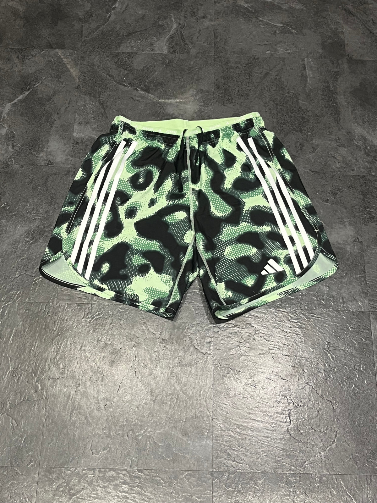 Striking Green Adidas Men’s “Own The Run” 3 Stripe 7” Running Shorts