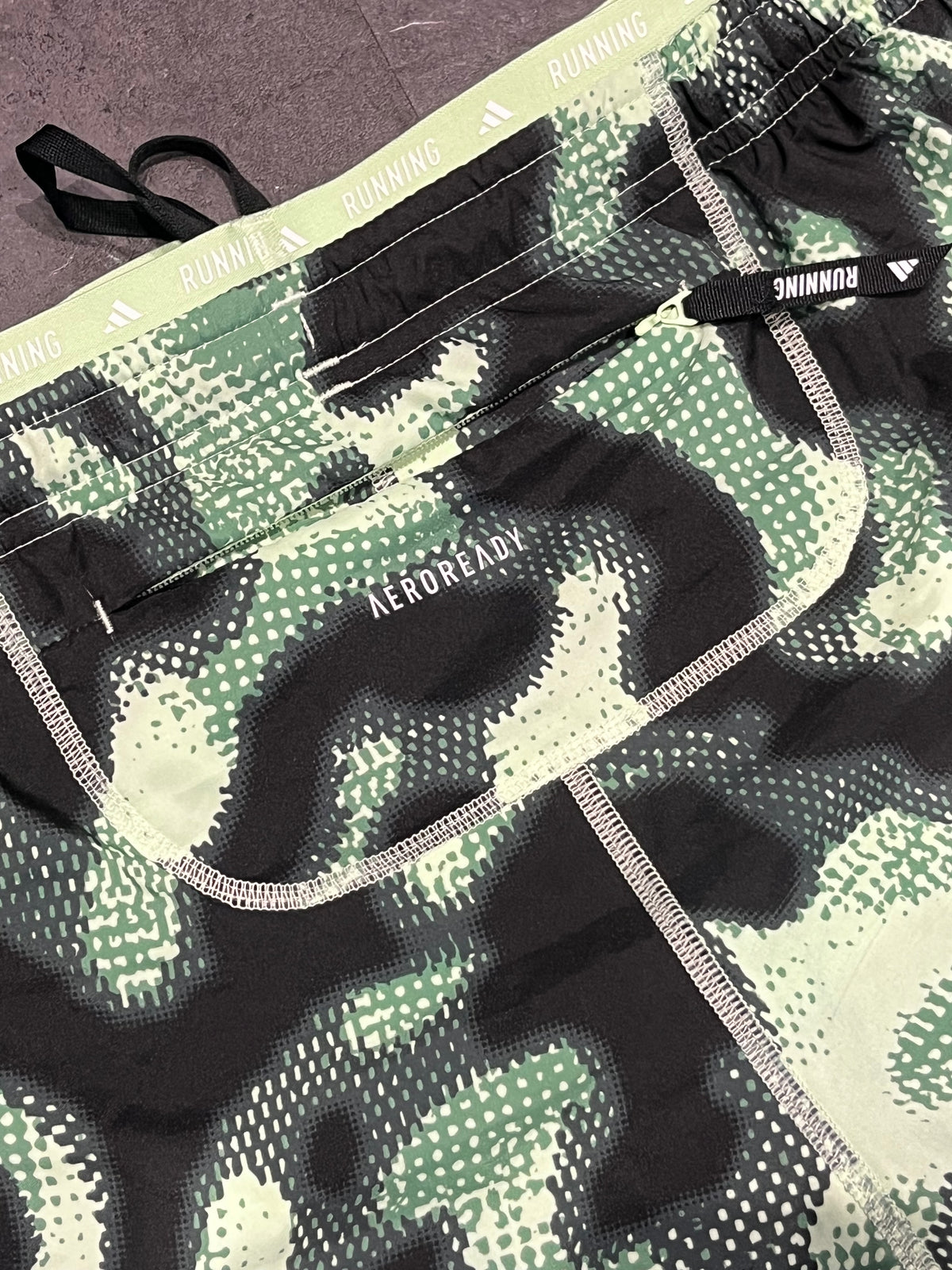Striking Green Adidas Men’s “Own The Run” 3 Stripe 7” Running Shorts