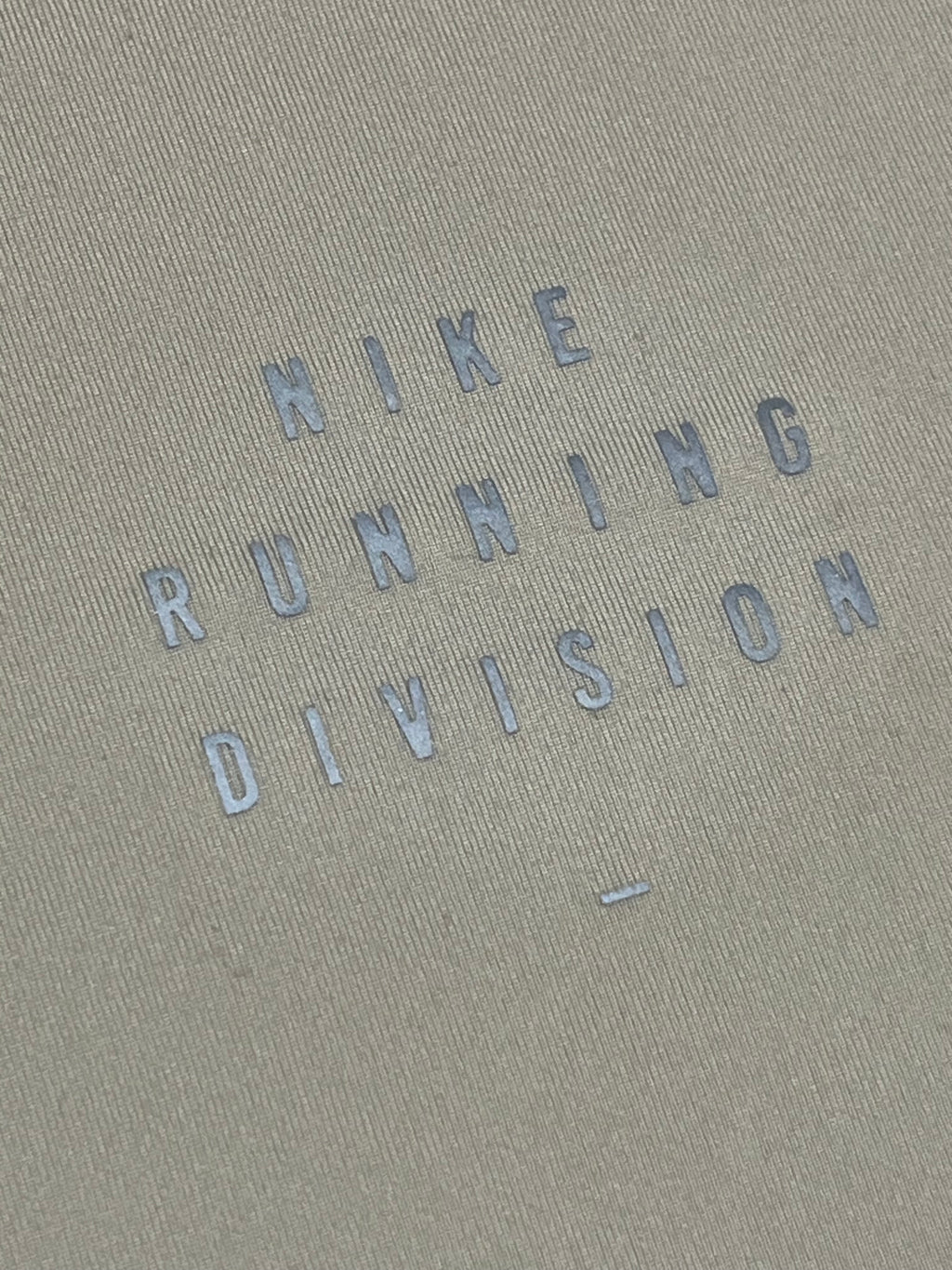 Beige Nike Men’s Dri Fit Rise 365 Running Division T Shirt