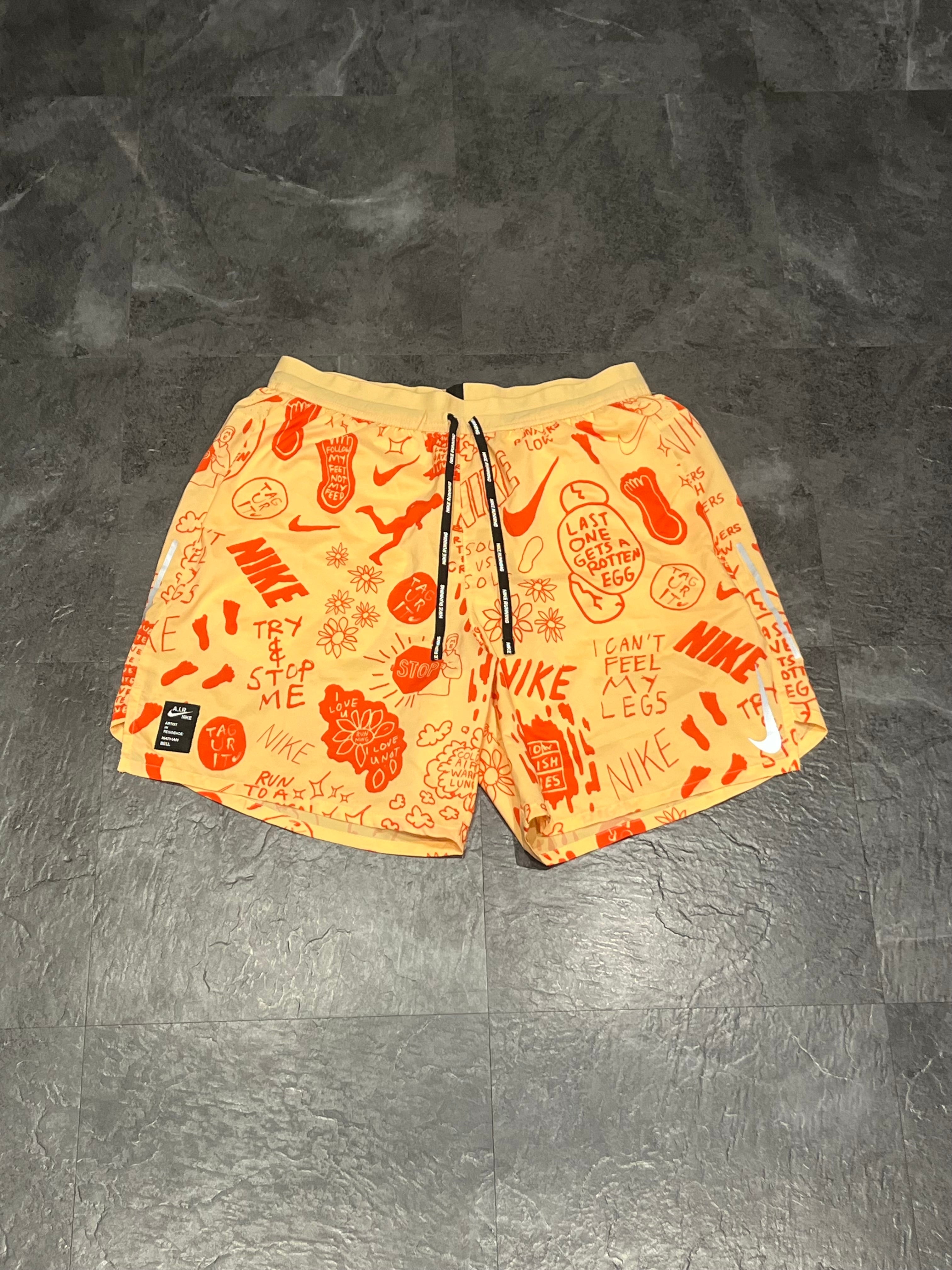 Yellow/Orange Nike A.I.R Nathan Bell Men’s Dri Fit Flex Stride 7” Running Shorts