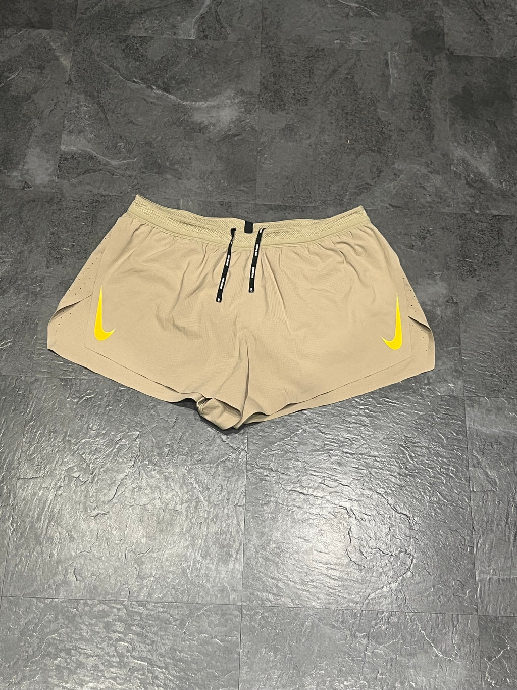 Beige Nike Men’s Dri Fit ADV Aeroswift 2” Racing Split Shorts