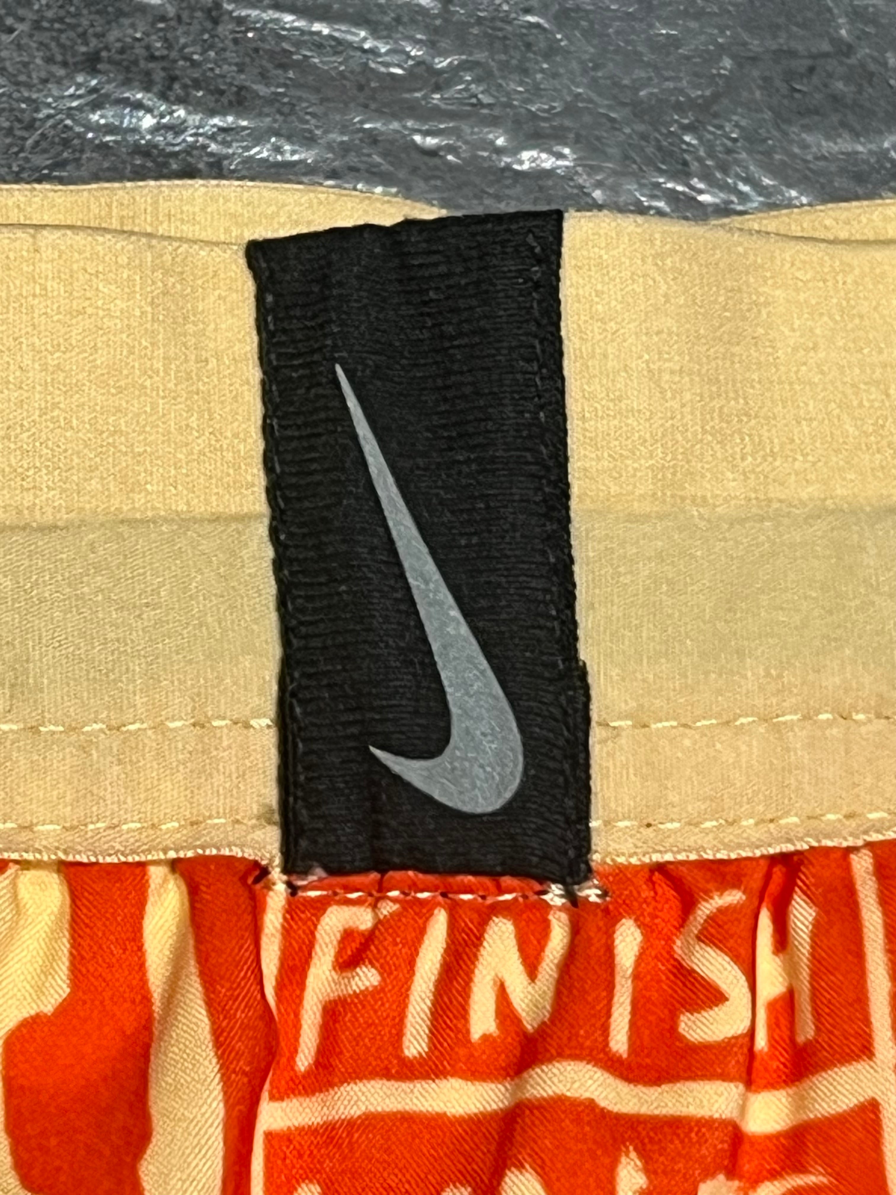 Yellow/Orange Nike A.I.R Nathan Bell Men’s Dri Fit Flex Stride 7” Running Shorts
