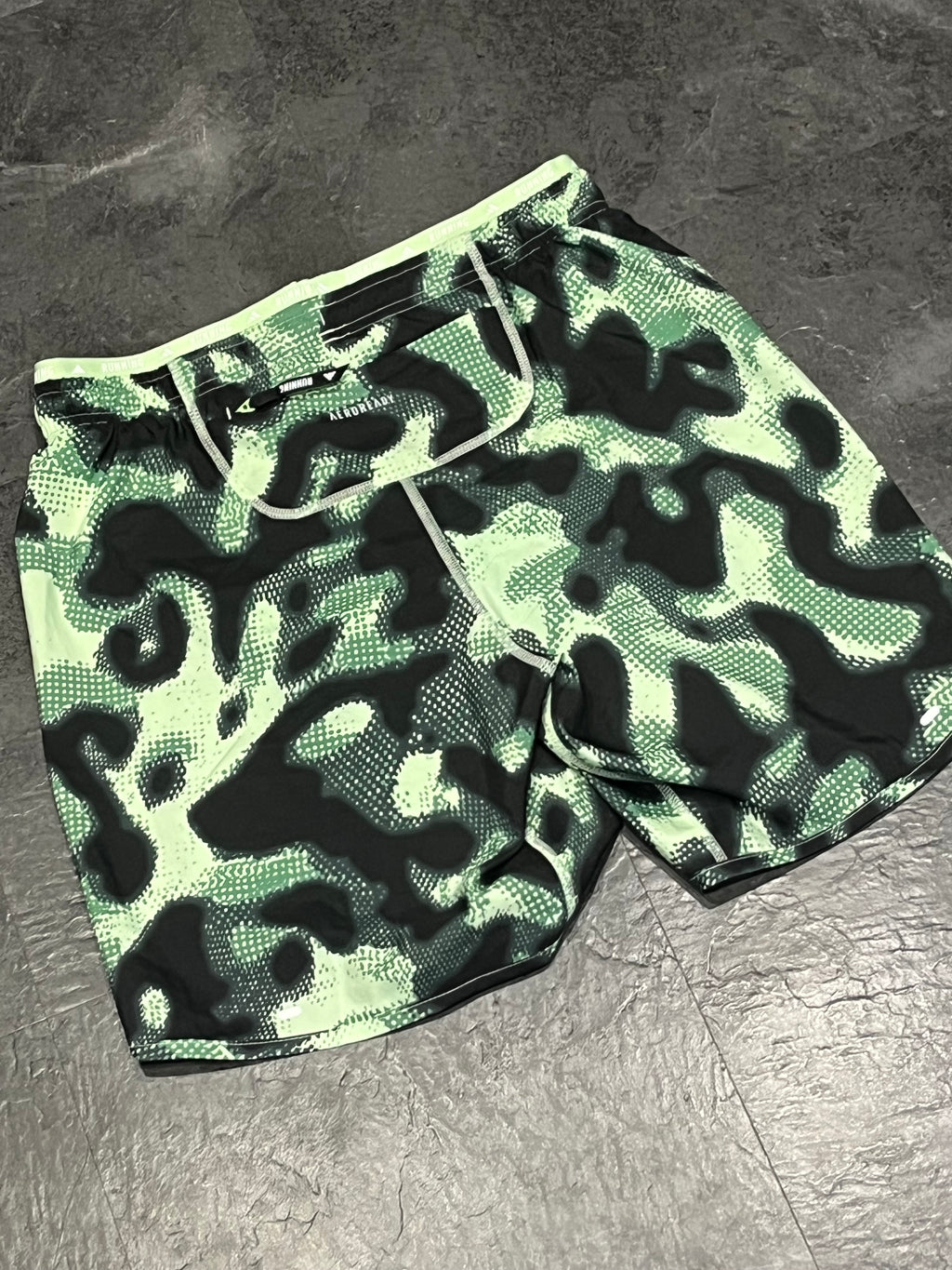 Striking Green Adidas Men’s “Own The Run” 3 Stripe 7” Running Shorts