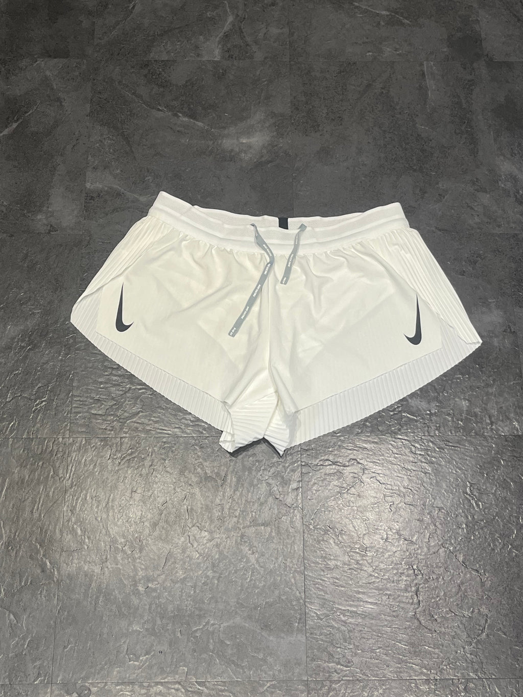White Nike Women’s Dri Fit ADV 3” Racing Split Shorts