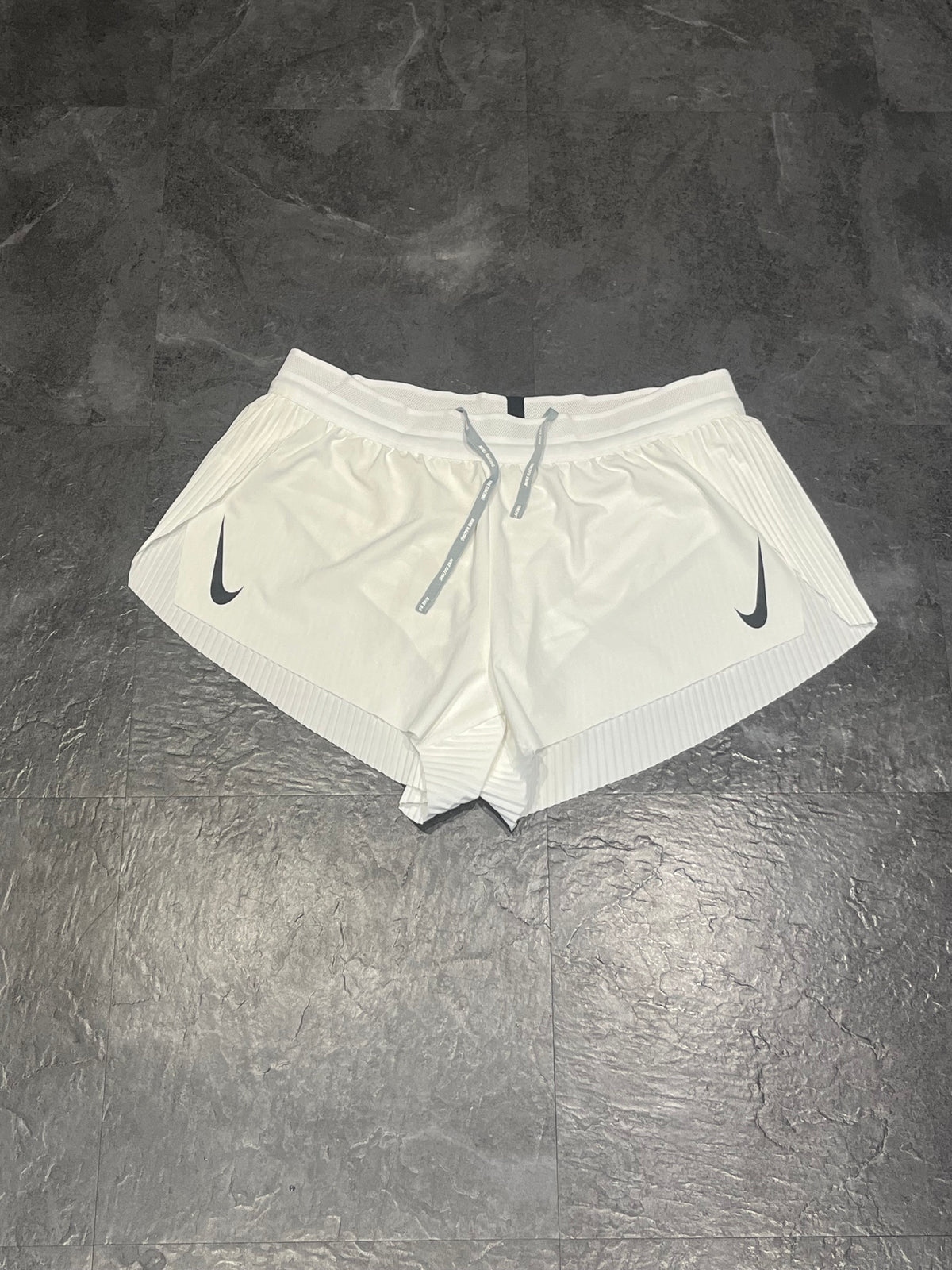 White Nike Women’s Dri Fit ADV 3” Racing Split Shorts