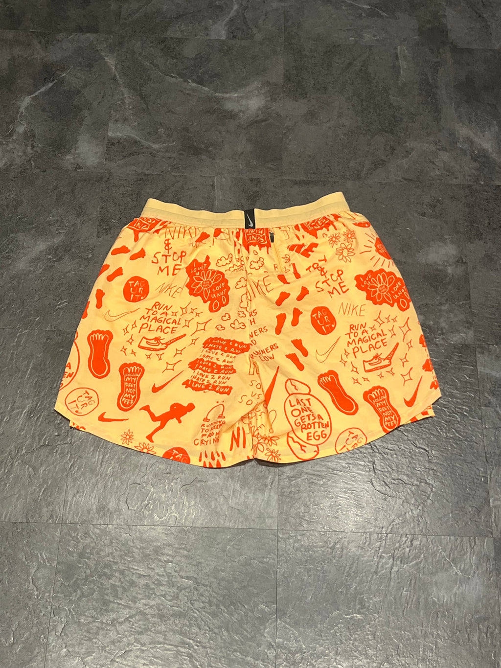 Yellow/Orange Nike A.I.R Nathan Bell Men’s Dri Fit Flex Stride 7” Running Shorts