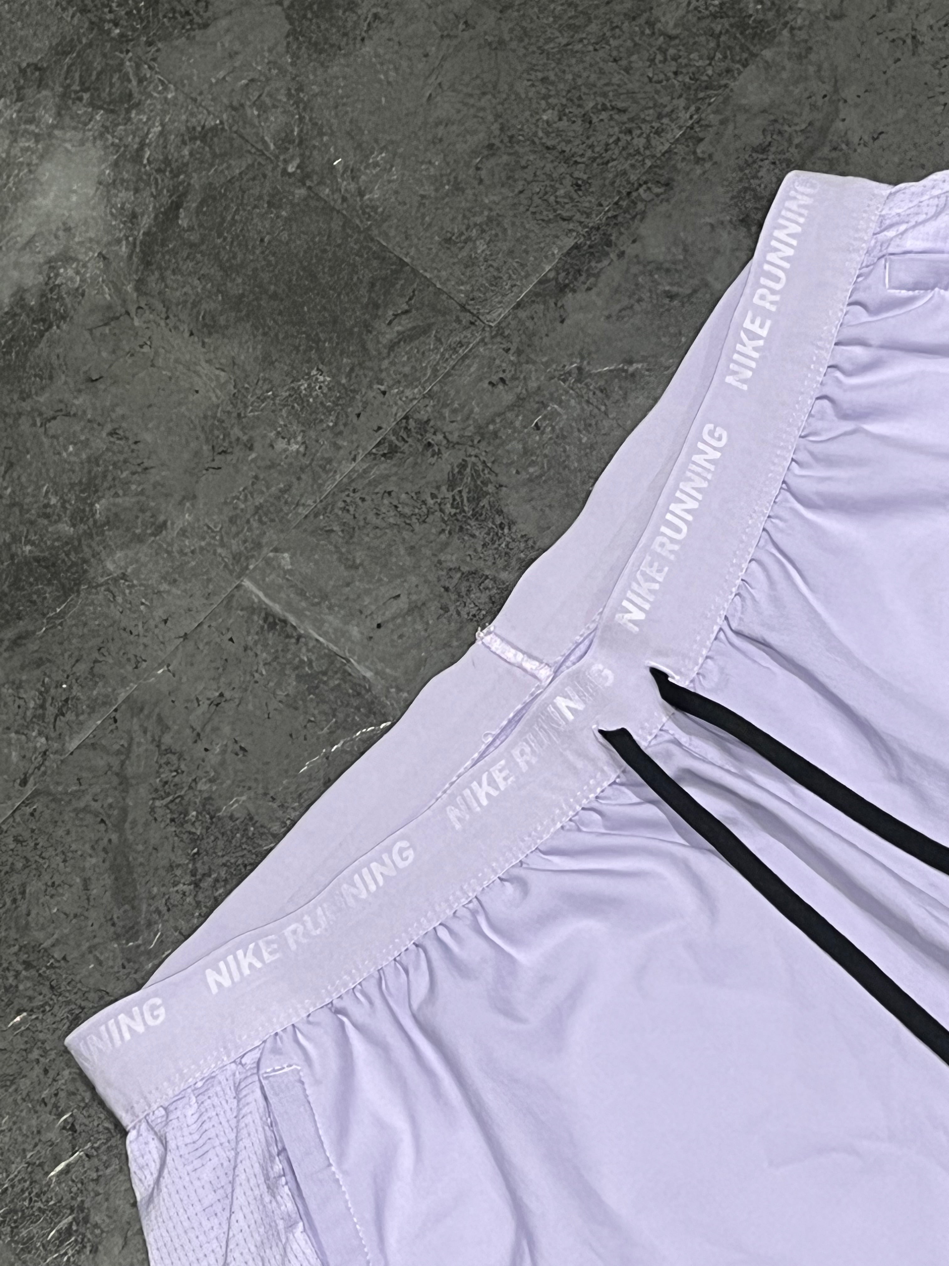 Light Purple Nike Men’s Dri Fit Flex Stride 7” Running Shorts