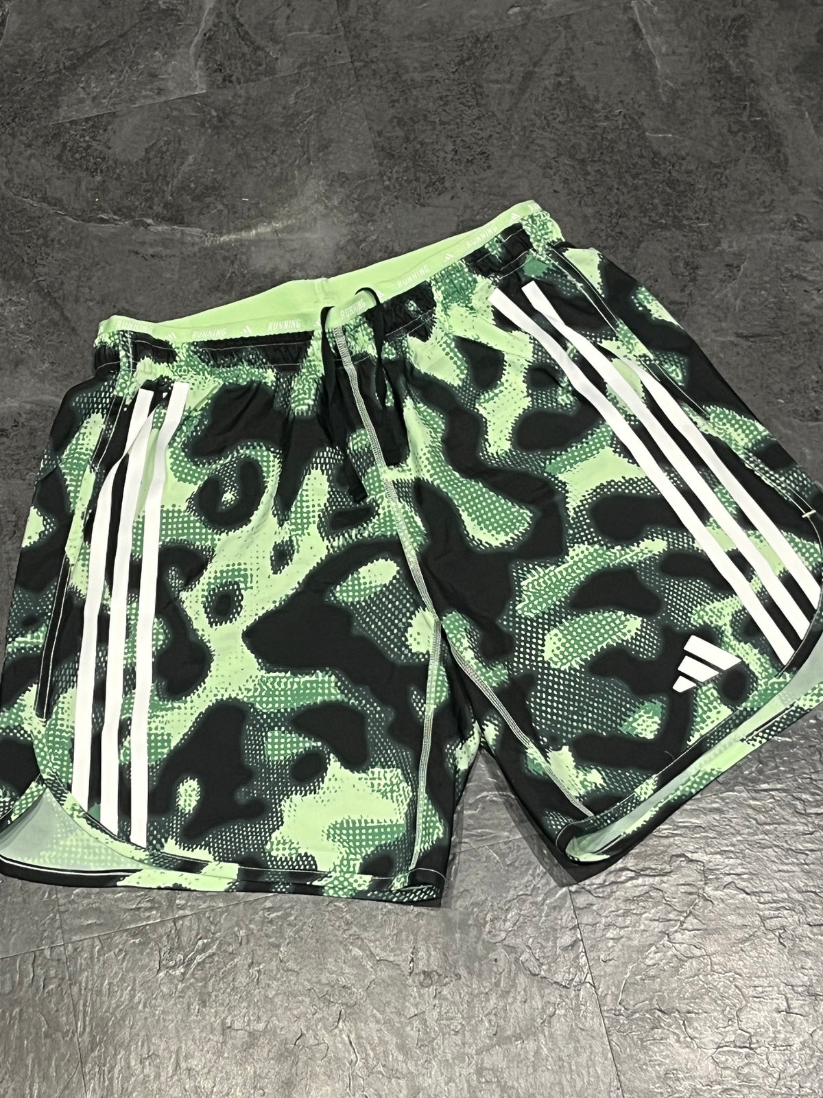 Striking Green Adidas Men’s “Own The Run” 3 Stripe 7” Running Shorts