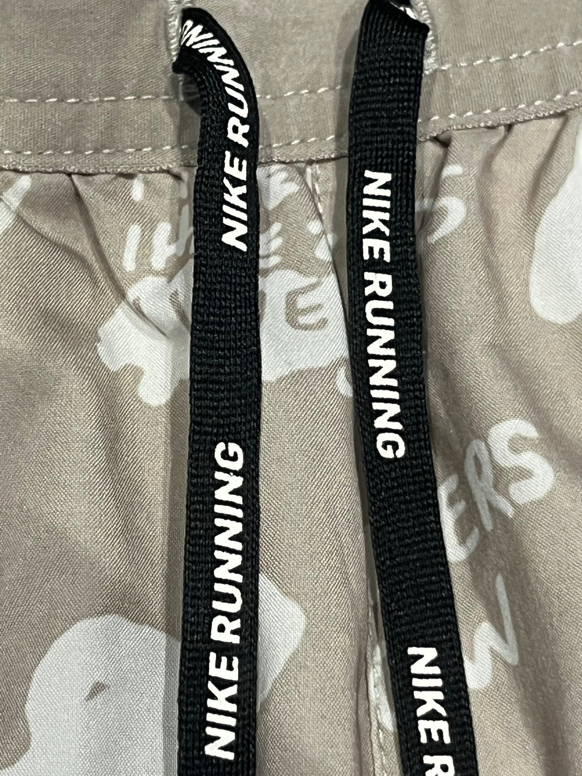 Beige Nike A.I.R Nathan Bell Men’s Dri Fit Flex Stride 7” Running Shorts