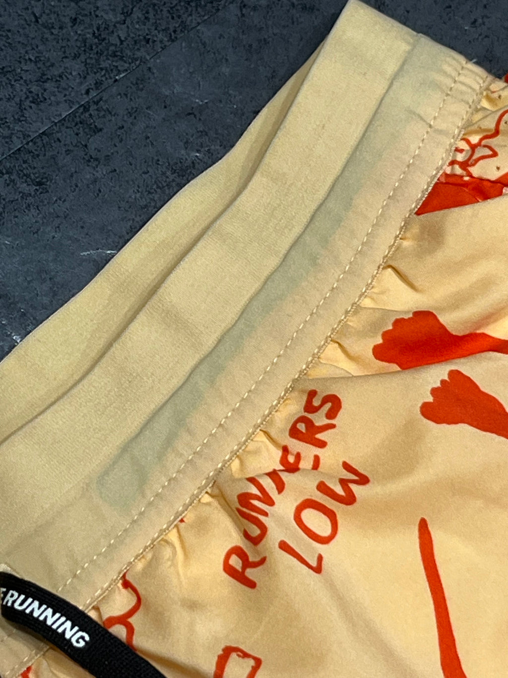 Yellow/Orange Nike A.I.R Nathan Bell Men’s Dri Fit Flex Stride 7” Running Shorts