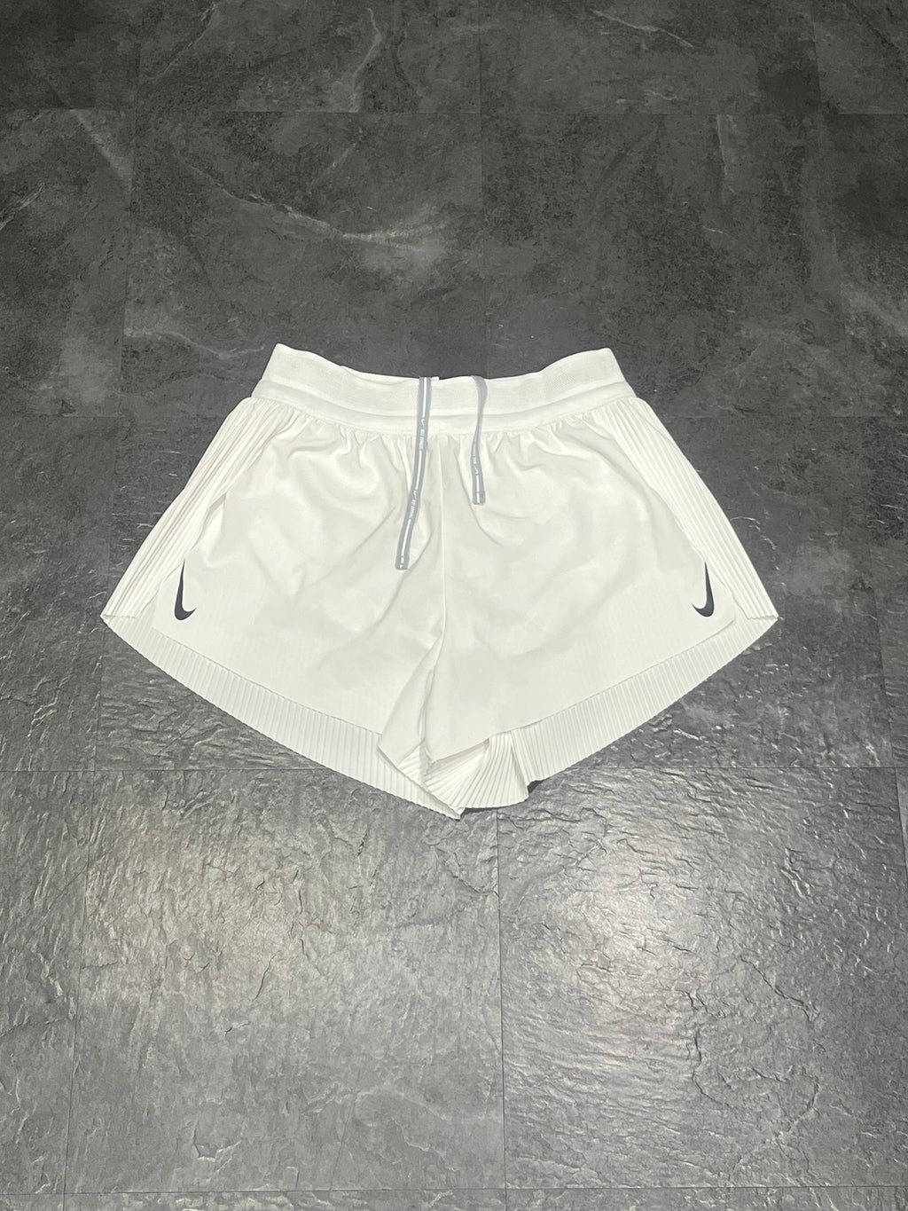 White Nike Women’s Dri Fit ADV Aeroswift 3” Racing Split Shorts