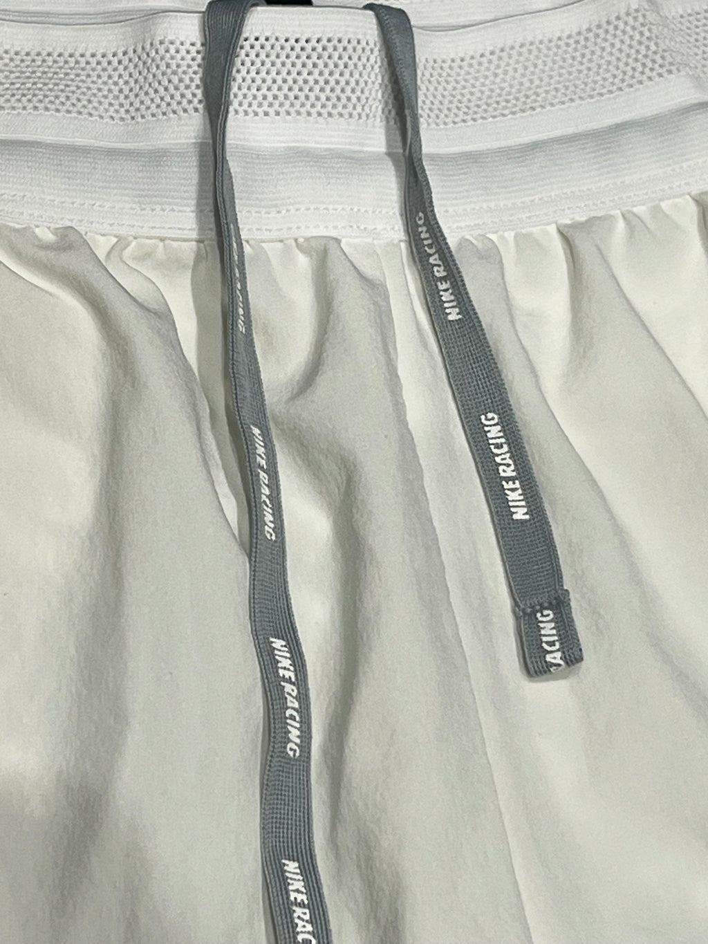 White Nike Women’s Dri Fit ADV AeroSwift Racing Split Shorts