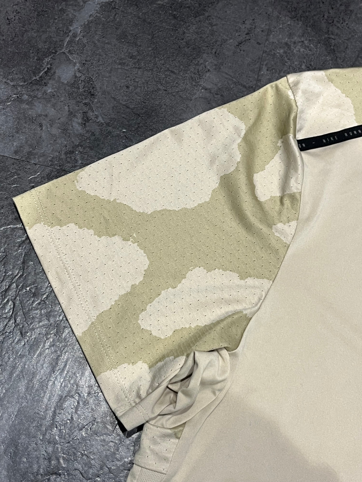 Beige Nike Men’s Dri Fit Rise 365 Running Division T Shirt