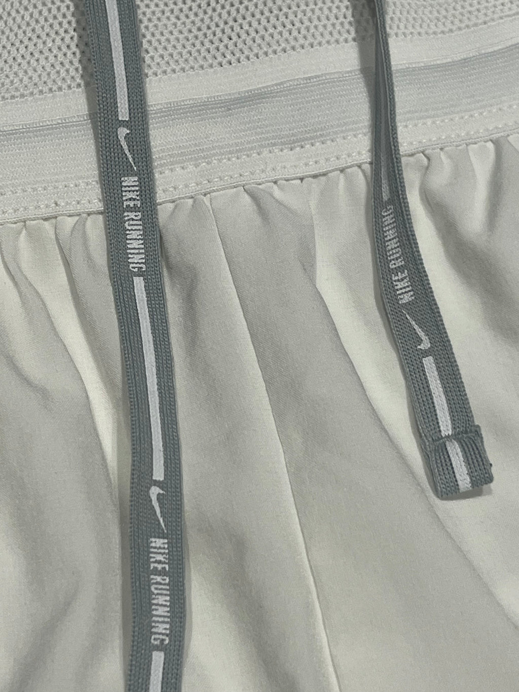 White Nike Women’s Dri Fit ADV Aeroswift 3” Racing Split Shorts