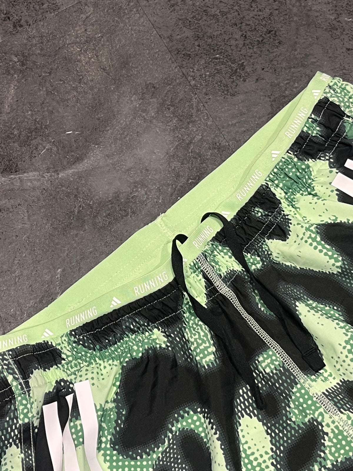 Striking Green Adidas Men’s “Own The Run” 3 Stripe 7” Running Shorts