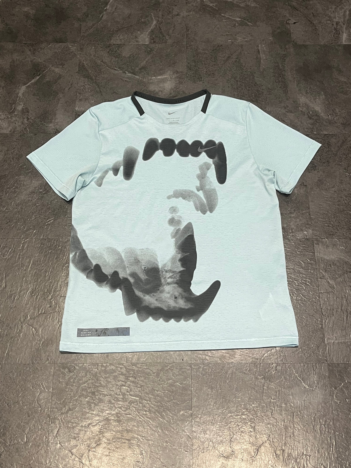 Light Blue Nike Men’s Dri Fit ADV Running Division “Wolf Jaws” T Shirt