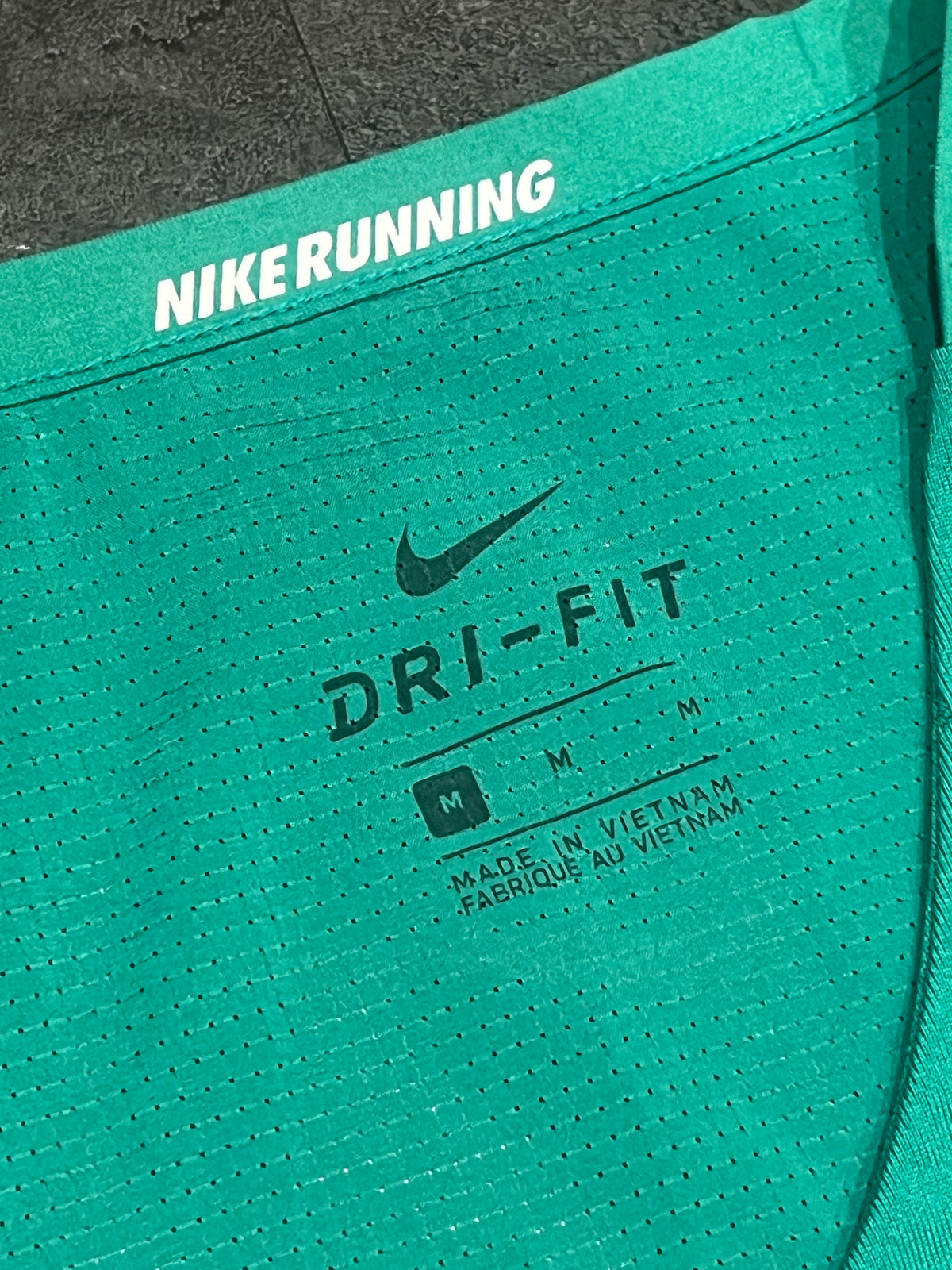 Green Nike Men’s Dri Fit Rise 365 Running Division Singlet