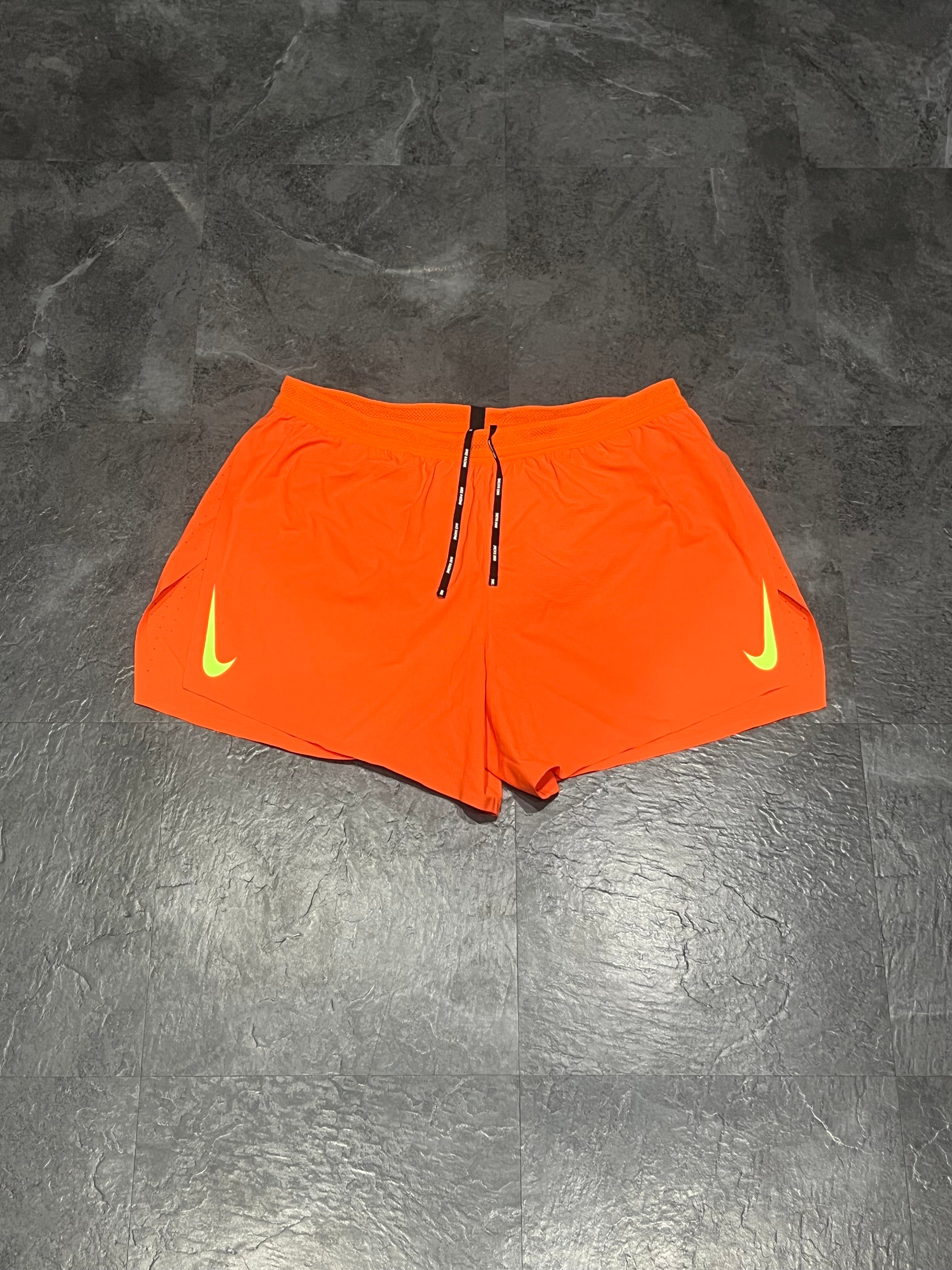 Orange & Ghost Green Nike Men’s Dri Fit ADV Aeroswift 4” Racing Split Shorts