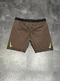 Brown & Green Nike Men’s Dri Fit ADV Aeroswift Racing 1/2 Tights